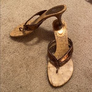 Brown heel flip flops